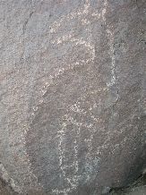 Kokopelli rock carving 