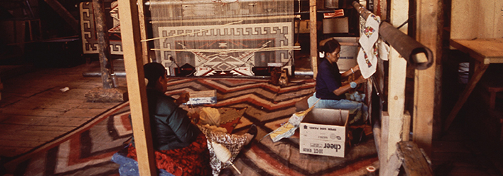 Navajo Women Weaving Rugs
